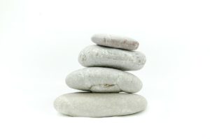 white stones stacked: cairn 